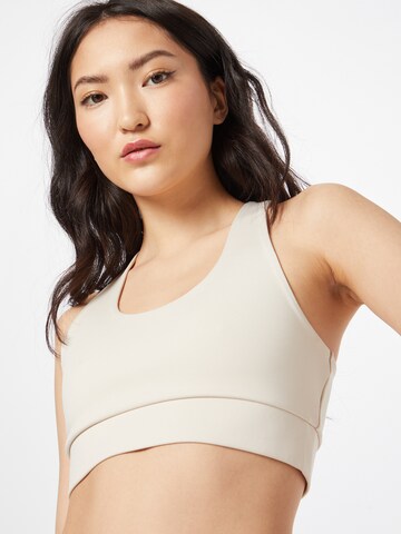 ABOUT YOU Sport-Top 'Mila' in Beige