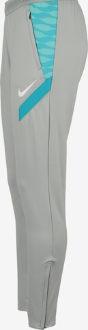 NIKE Slim fit Workout Pants in Grey