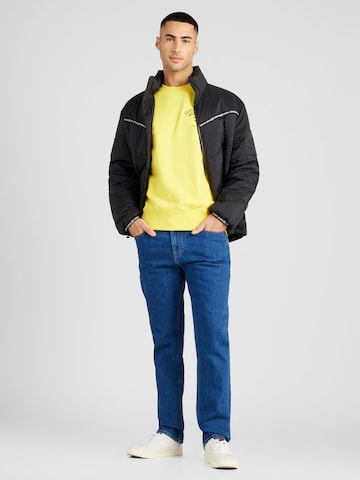 Felpa 'ARCHED VARSITY' di TOMMY HILFIGER in giallo