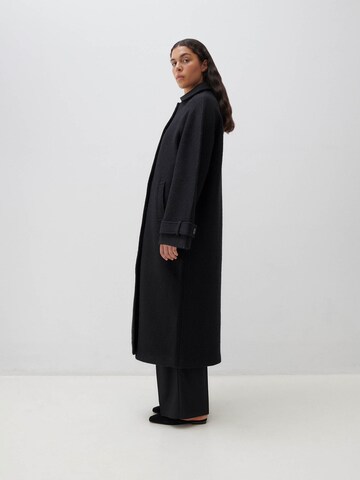 ABOUT YOU x Marie von Behrens Between-seasons coat 'Lilli' in Black