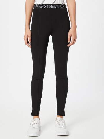 Calvin Klein Jeans Skinny Legíny – černá: přední strana
