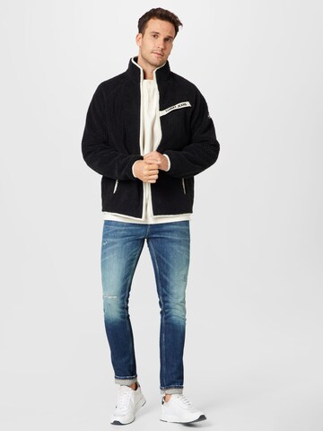 Tommy Jeans Prehodna jakna | črna barva