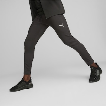 PUMA Дънки Tapered Leg Функционален панталон в черно: отпред