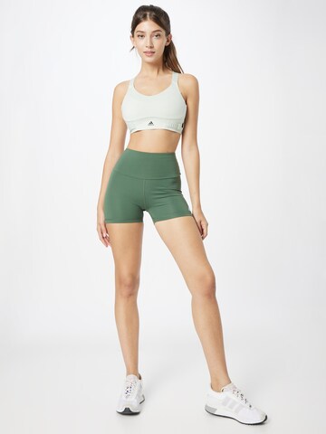 ADIDAS SPORTSWEAR Skinny Sportshorts in Grün