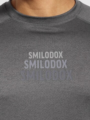 T-Shirt ' Powerfit Triple ' Smilodox en gris