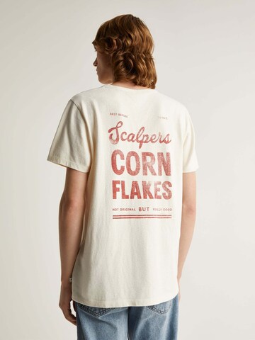 Maglietta 'Flakes' di Scalpers in bianco: frontale