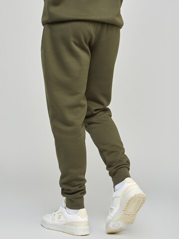 SikSilk Flared Sporthose in Grün