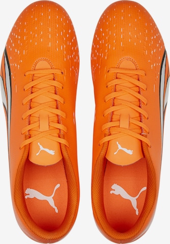 Chaussure de foot PUMA en orange