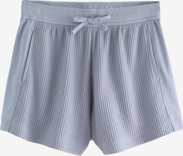 zils Next Standarta Bikses: no priekšpuses