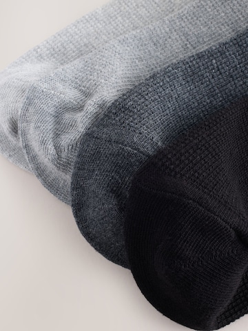 Next Sockor i grå
