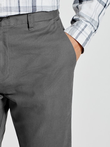 regular Pantaloni chino di Next in grigio