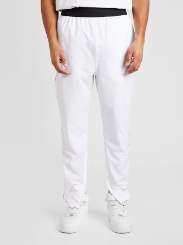 Regular Pantaloni sport de la ELLESSE pe alb: față