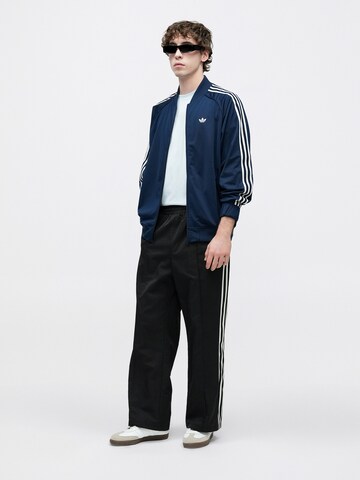 mėlyna ADIDAS ORIGINALS Demisezoninė striukė 'BRITCORE'