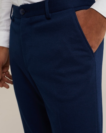 WE Fashion - Slimfit Calças com vincos em azul