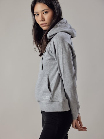 Sweat-shirt 'Felpa con Cappuccio' OWN Off With Nature en gris