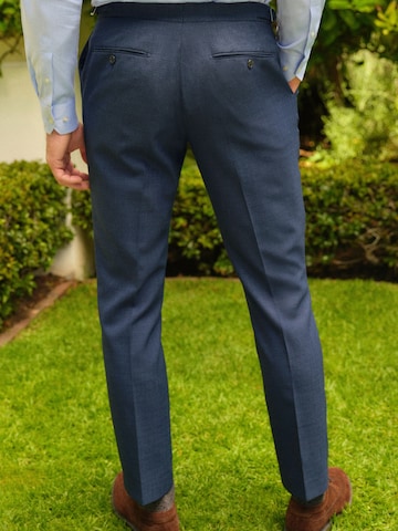 Next Slimfit Suorat housut värissä sininen