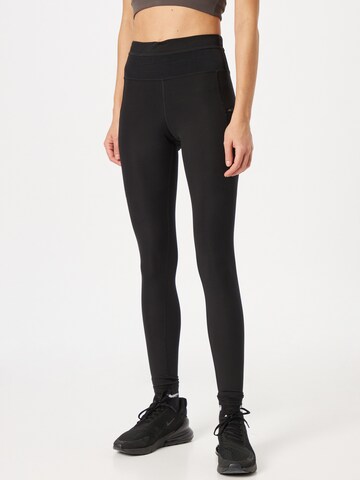 NIKE Skinny Sports trousers in Black: front