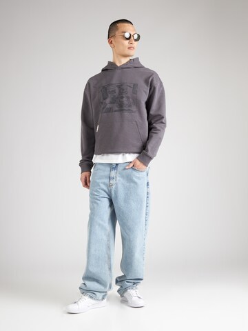 SCOTCH & SODA Sweatshirt 'JOE JONAS X SCOTCH SODA' in Grijs