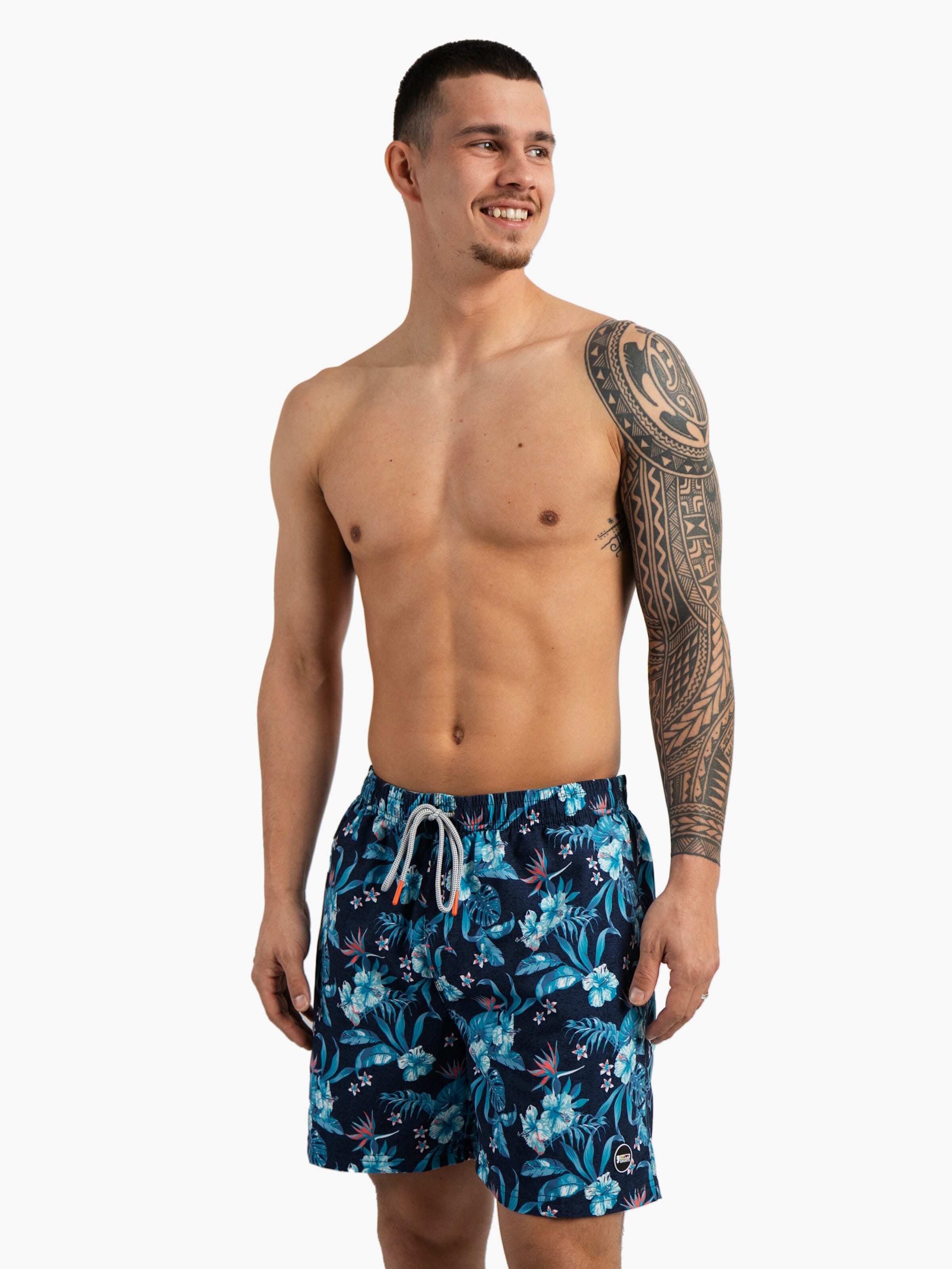 Happy Shorts Board Shorts in Blue: front