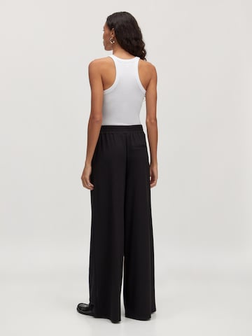 EDITED - Loosefit Pantalón 'Jenna' en negro