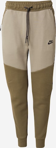 Pantalon 'TCH FLC' Nike Sportswear en vert : devant