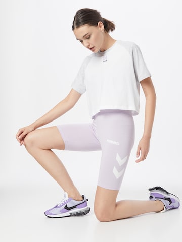 Hummel Skinny Spodnie sportowe 'Legacy' w kolorze fioletowy
