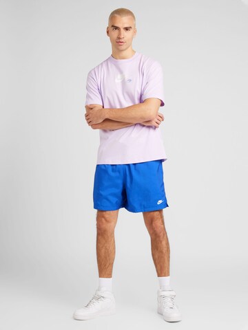 Nike Sportswear Loosefit Broek 'CLUB' in Blauw