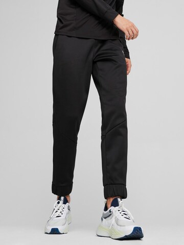 PUMA Tapered Workout Pants 'Train All Day' in Black: front