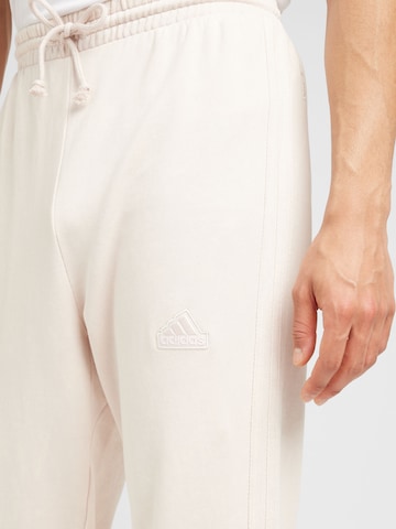 ADIDAS SPORTSWEAR Tapered Workout Pants in Beige