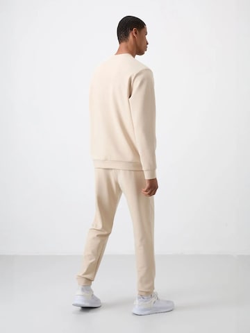Tuta da jogging di Tommy Life in beige