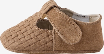 Next Nyfödd i brun: framsida