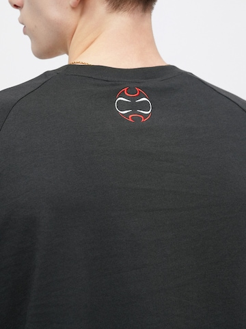 ADIDAS ORIGINALS Paita 'TEAMGEIST' värissä musta