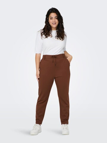 Regular Pantalon 'Goldtrash' ONLY Carmakoma en rouge