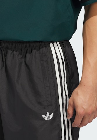 ADIDAS ORIGINALS Loose fit Trousers in Black