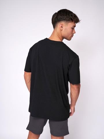 Maglietta 'Essential Oversized T-shirt' di Fortex Fitness in nero