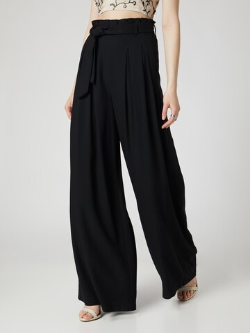 Guido Maria Kretschmer Women Loose fit Pleat-front trousers 'Fee' in Black: front