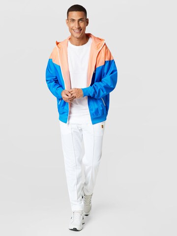 Nike Sportswear Φθινοπωρινό και ανοιξιάτικο μπουφάν σε μπλε
