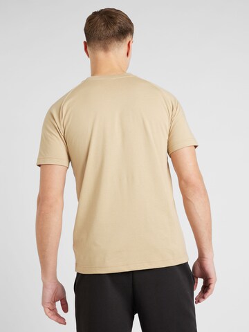 PUMA Performance shirt in Brown