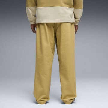 PUMA Regular Broek 'Porsche Legacy' in Bruin