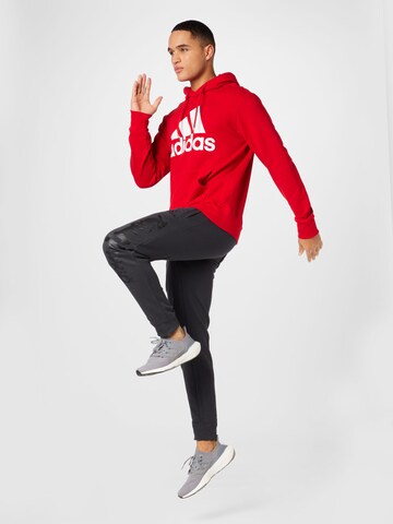 sarkans ADIDAS SPORTSWEAR Sportiska tipa džemperis 'Essentials'