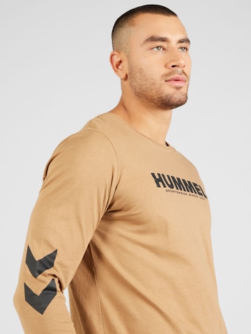 Hummel Функционална тениска 'Legacy' в кафяво