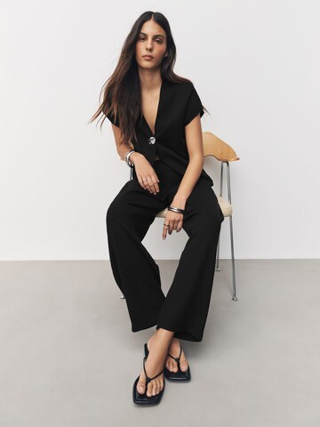 Next Tapered Housut värissä musta