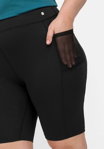 SHEEGO Skinny Trousers in Black