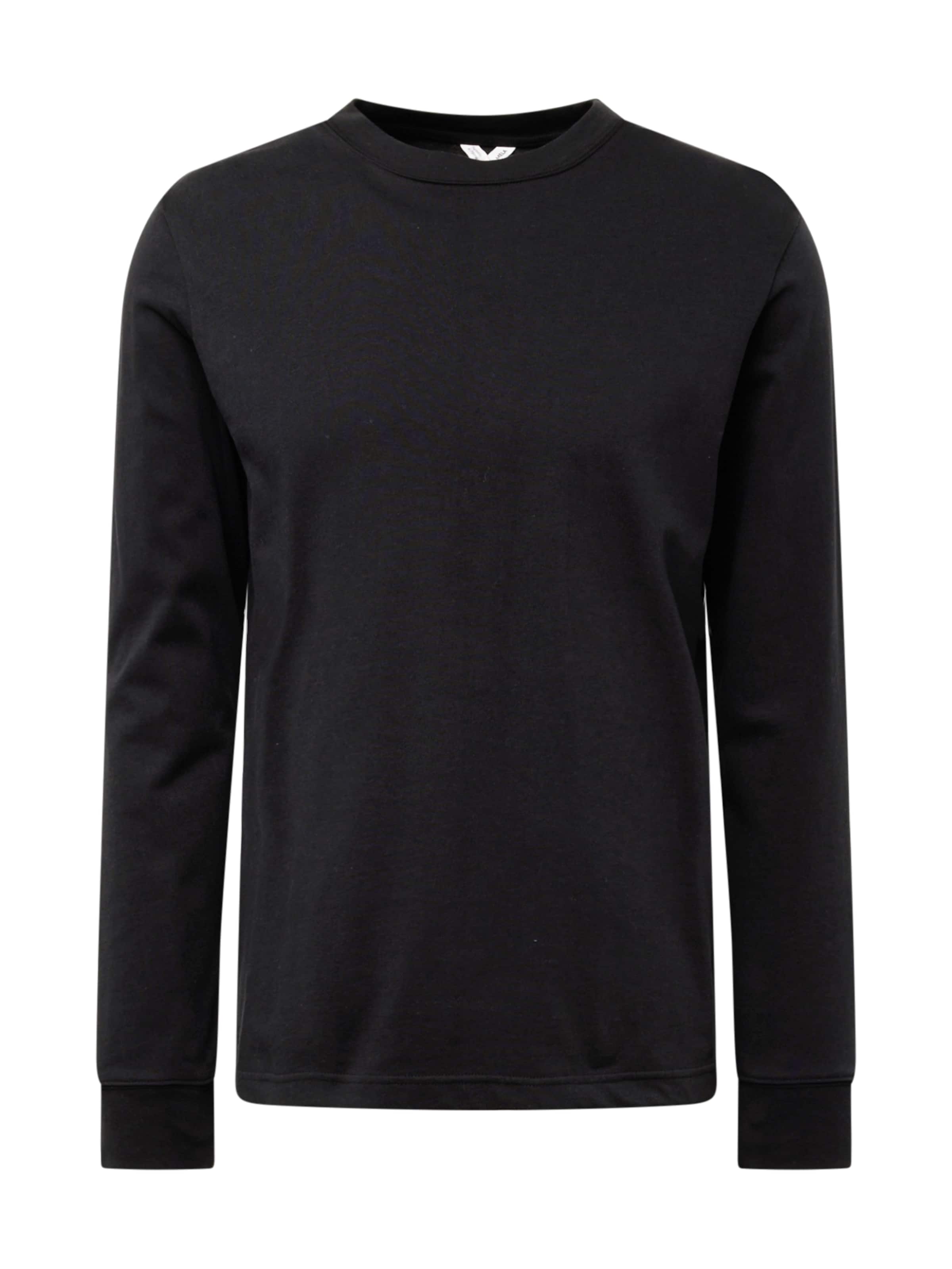 MELA T-shirt 'TEJAS' i svart: framsida