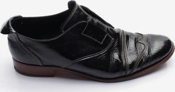 JIL SANDER Flats & Loafers in 38 in Black: front