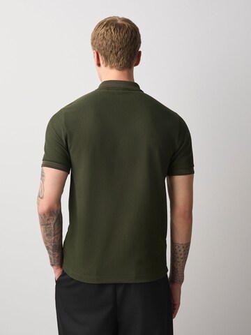 Next Poloshirt in Grün