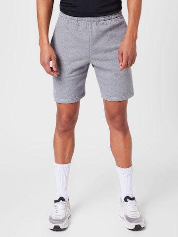 UNDER ARMOUR Regular Workout Pants in Grey: front