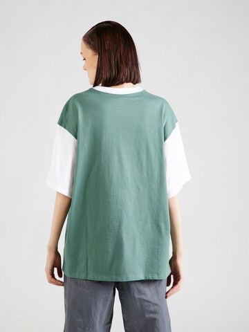 LEVI'S ® Shirt 'Graphic Short Stack Tee' in Grün