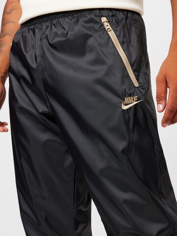 Nike Sportswear Дънки Tapered Leg Панталон в черно
