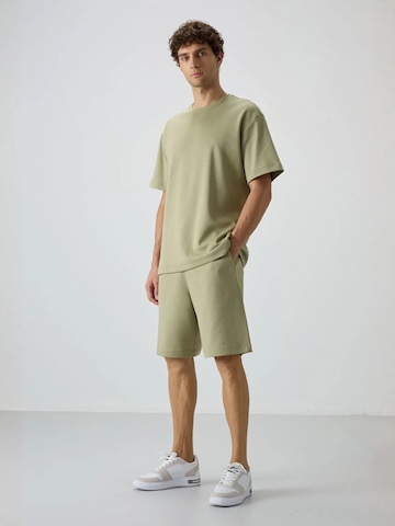Survêtement Tommy Life en vert : devant